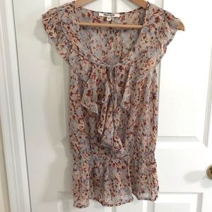 Floral ruffled sleeveless blouse